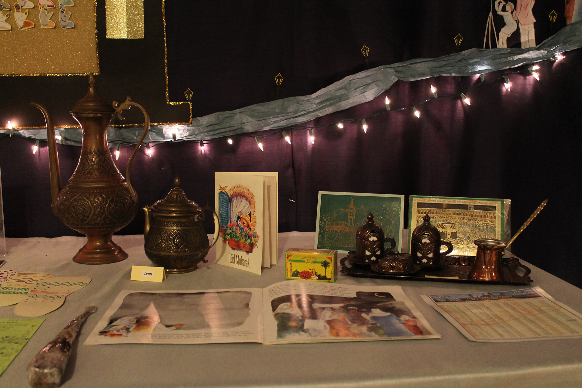 Ramadan display at museum, including texts and containers