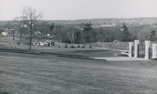 Hendrie Gate and grounds, x. 1963 archival photo of the grounds where Hendrie Park was to being built. The tall gates are visible on the righthand side