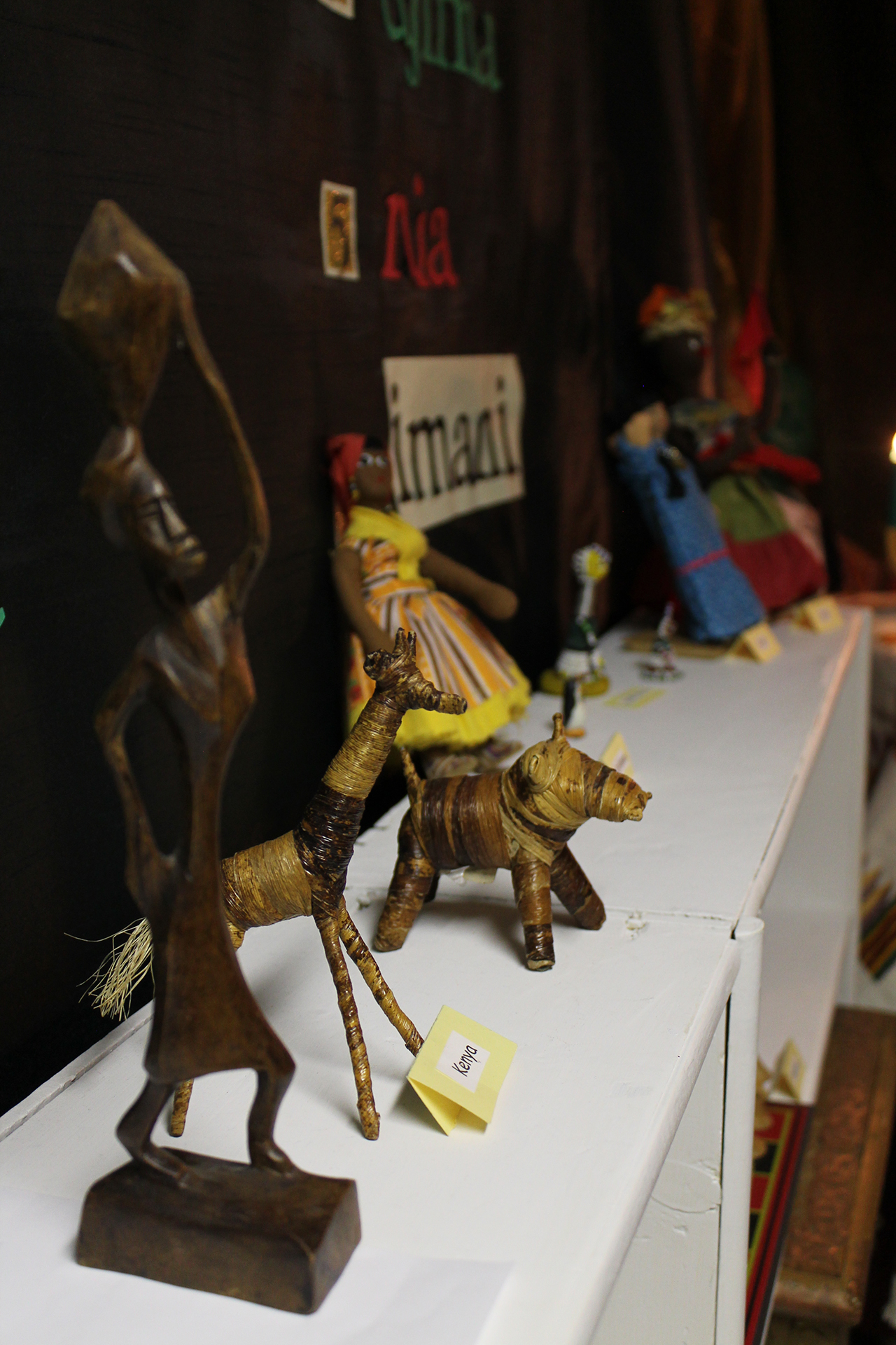 Kwanza decor including small sculptures of people and animals