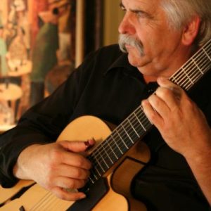 Michael Maguire Michael Maguire playing guitar