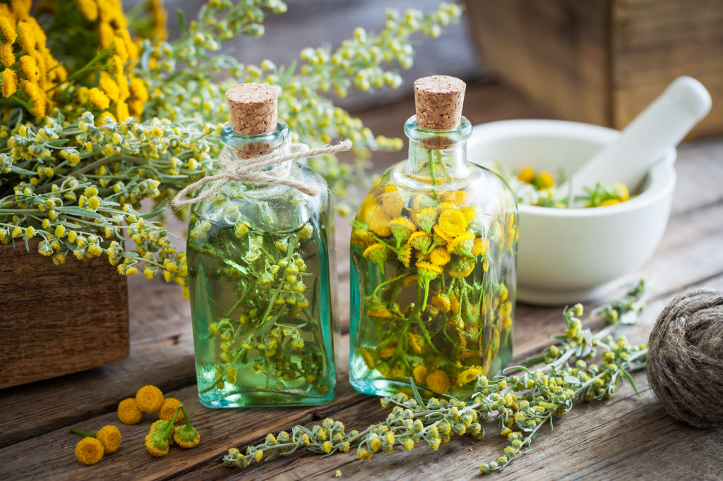 Botanicals In Containers With Oils
