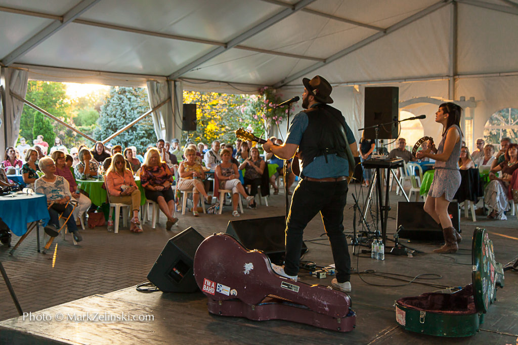 Folk Musicians Performing On Stage Under Tent Credit Markzelinski.com