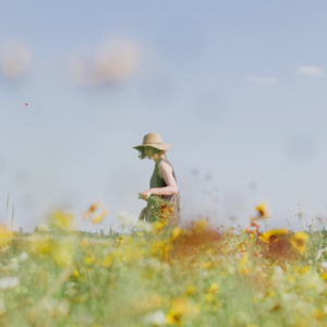 jessica-gale Jessica gale picking yellow wildflowers in a field