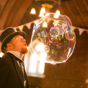 Jojo Fun Bubble Show JoJo by a giant bubble full of smaller bubbles