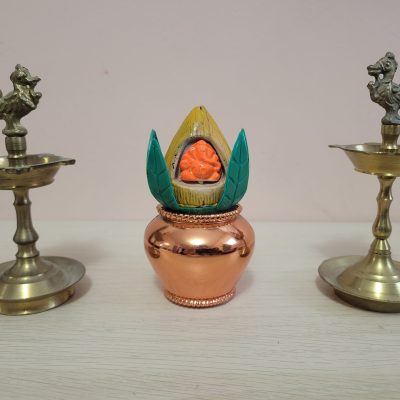 pooja 2021 Brass rooster oil lamps and mini coconut in middle used during pooja for Thirukumar Family Brass rooster oil lamps and mini coconut in middle used during pooja for Thirukumar Family